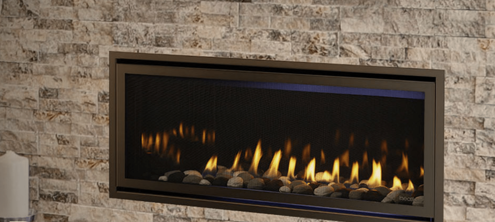 fireplace in home with a stone surround