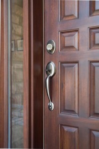 door handle on wooden front door