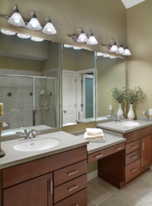 mirrors above double sink in bathroom